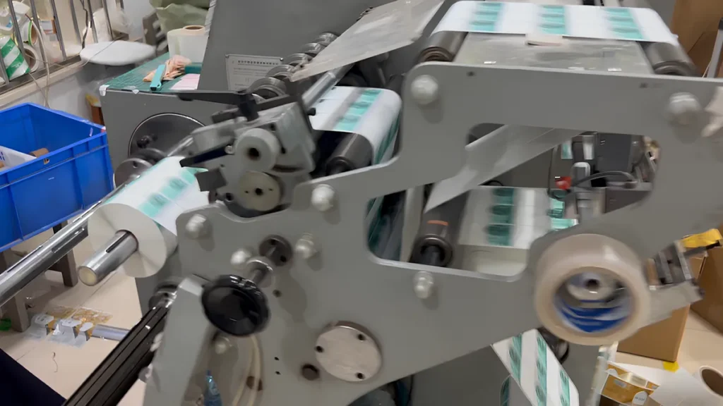 thermal label jumbo roll feeding into slitting machine